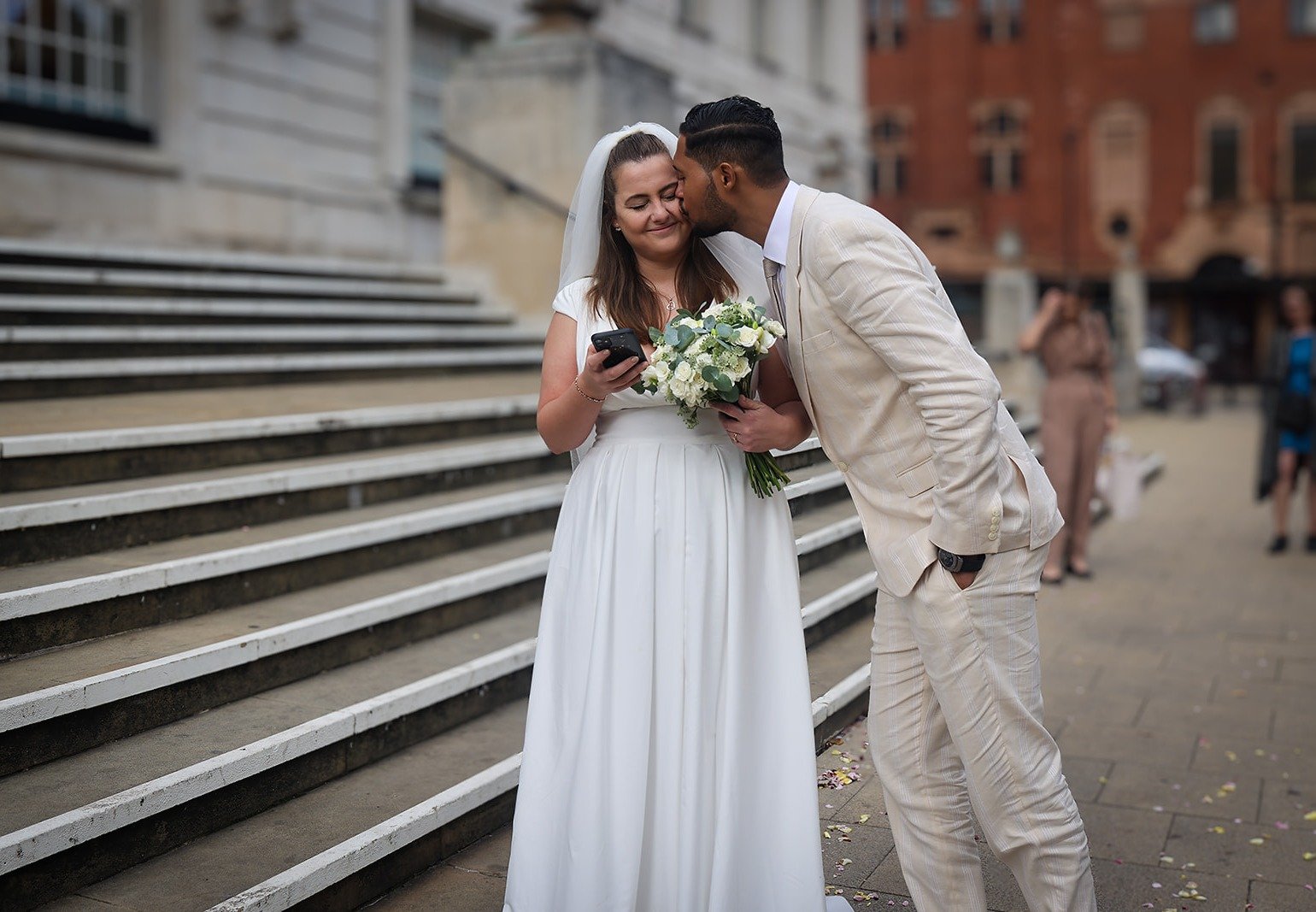 Just married, town hall steps