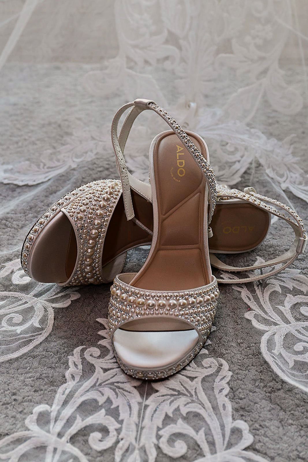 Bridal wedding shoe detail on lace veil